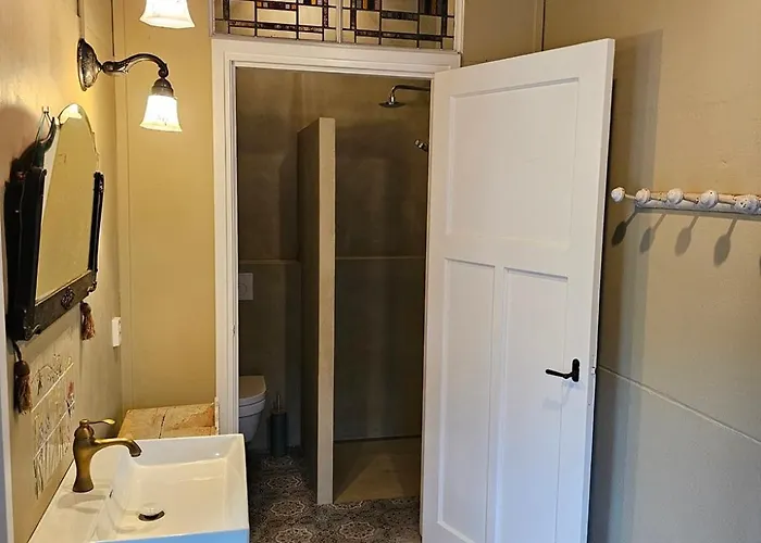 Logeerderij Tussen Koe & Kroonluchter Séjour à la ferme