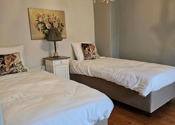 Logeerderij Tussen Koe & Kroonluchter Séjour à la ferme