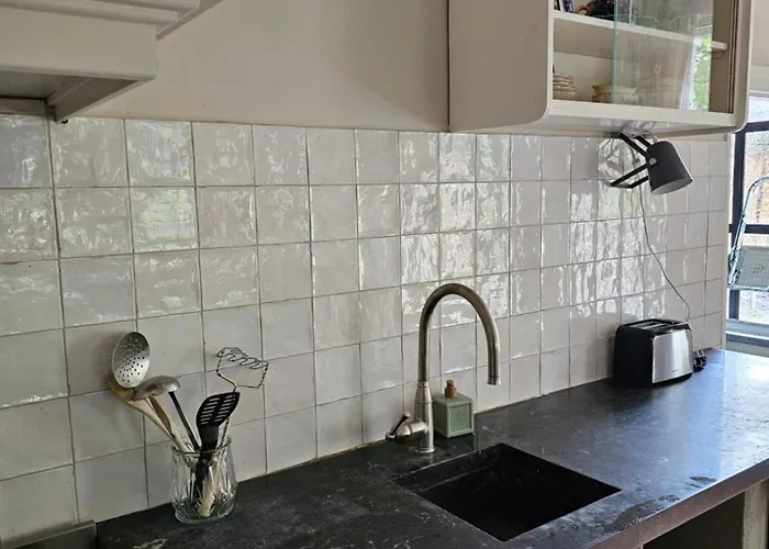 Logeerderij Tussen Koe & Kroonluchter Séjour à la ferme *