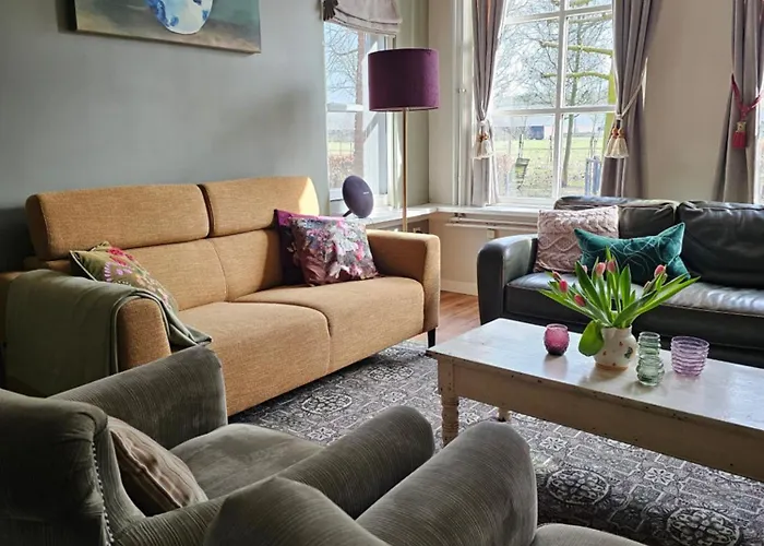 Logeerderij Tussen Koe & Kroonluchter Séjour à la ferme *